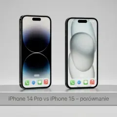 Dwa iPhone'y na srebrnej podstawce, jeden z ciemnym ekranem, drugi z jasnym. Porównanie iPhone 14 Pro vs iPhone 15.