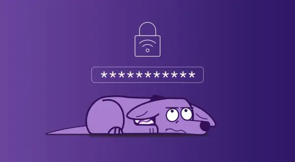Smutny piesek pod polem z gwiazdkami, symbolizującymi hasło. Nad nim kłódka z ikoną Wi-Fi, wskazująca na klucz zabezpieczeń sieciowych.