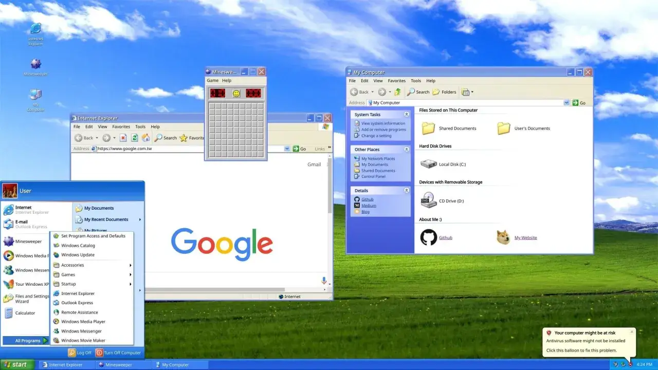 Klasyczny pulpit Windows XP z otwartymi grami Minesweeper, Internet Explorerem i oknem 