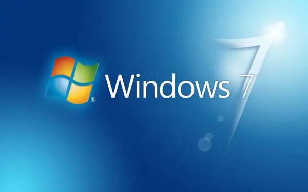 Logo Windows 7 na niebieskim tle. Klasyczny wygląd systemu, który wielu wspomina z sentymentem.